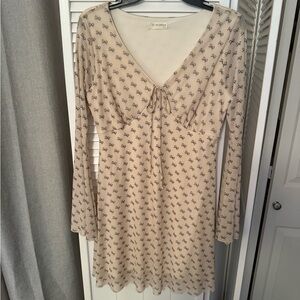 Chic Cream Dress with Patterned Design